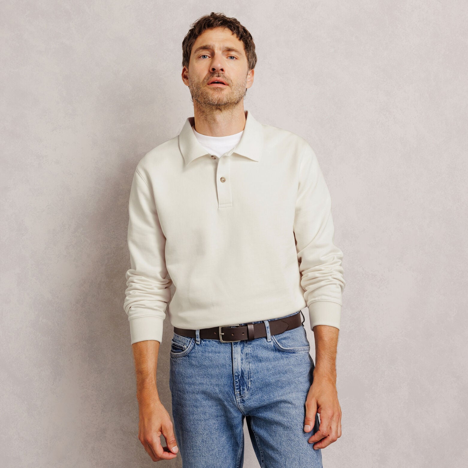 Polo en molleton boutonn&eacute; uni