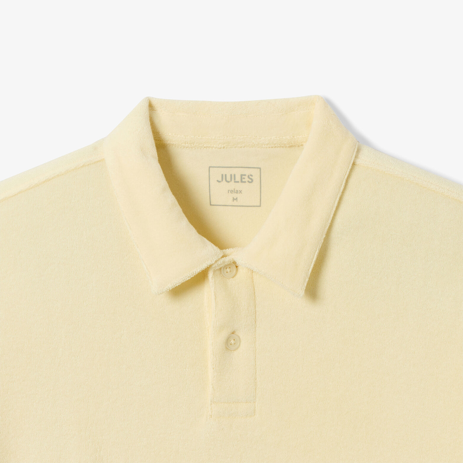 Polo manches courtes uni mati&egrave;re &eacute;ponge