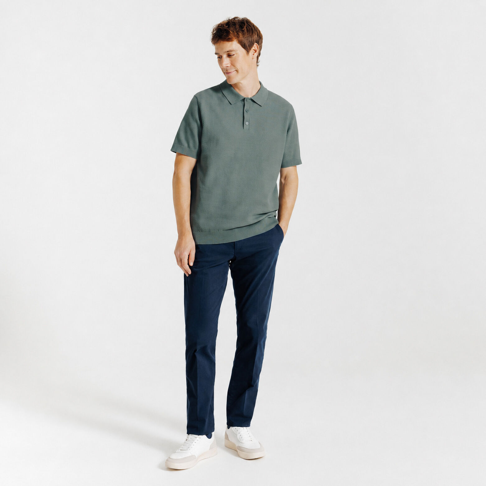 Polo met knoopkraag in tricot met fantasie stekenp