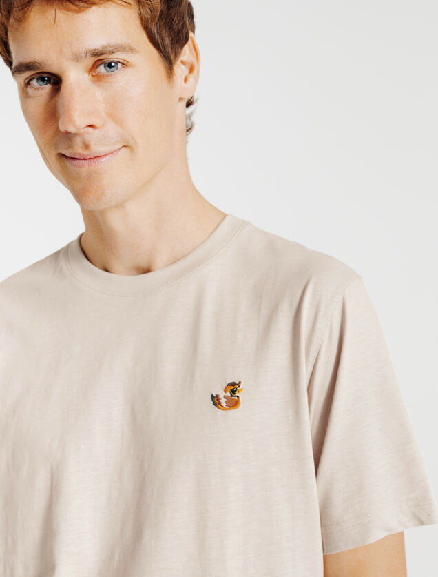 T-shirt in gevlamde stof met borduursel op de bors