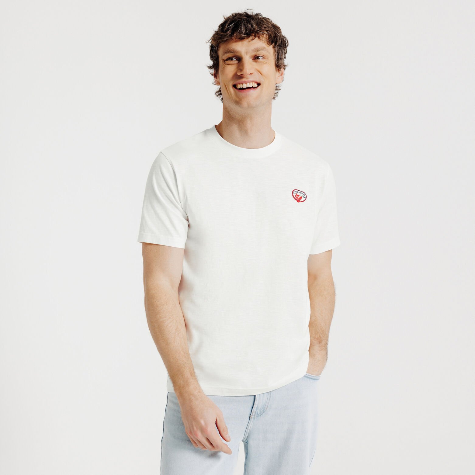 T-shirt in gevlamde stof met borduursel op de bors