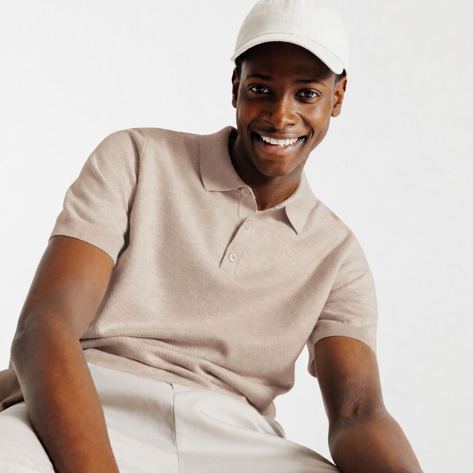 Polo met knoopkraag in tricot met fantasie stekenp