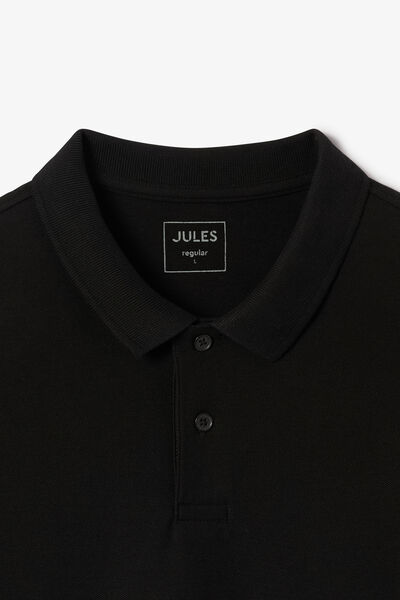 Effen polo in piqu&eacute;katoen met korte mouwen