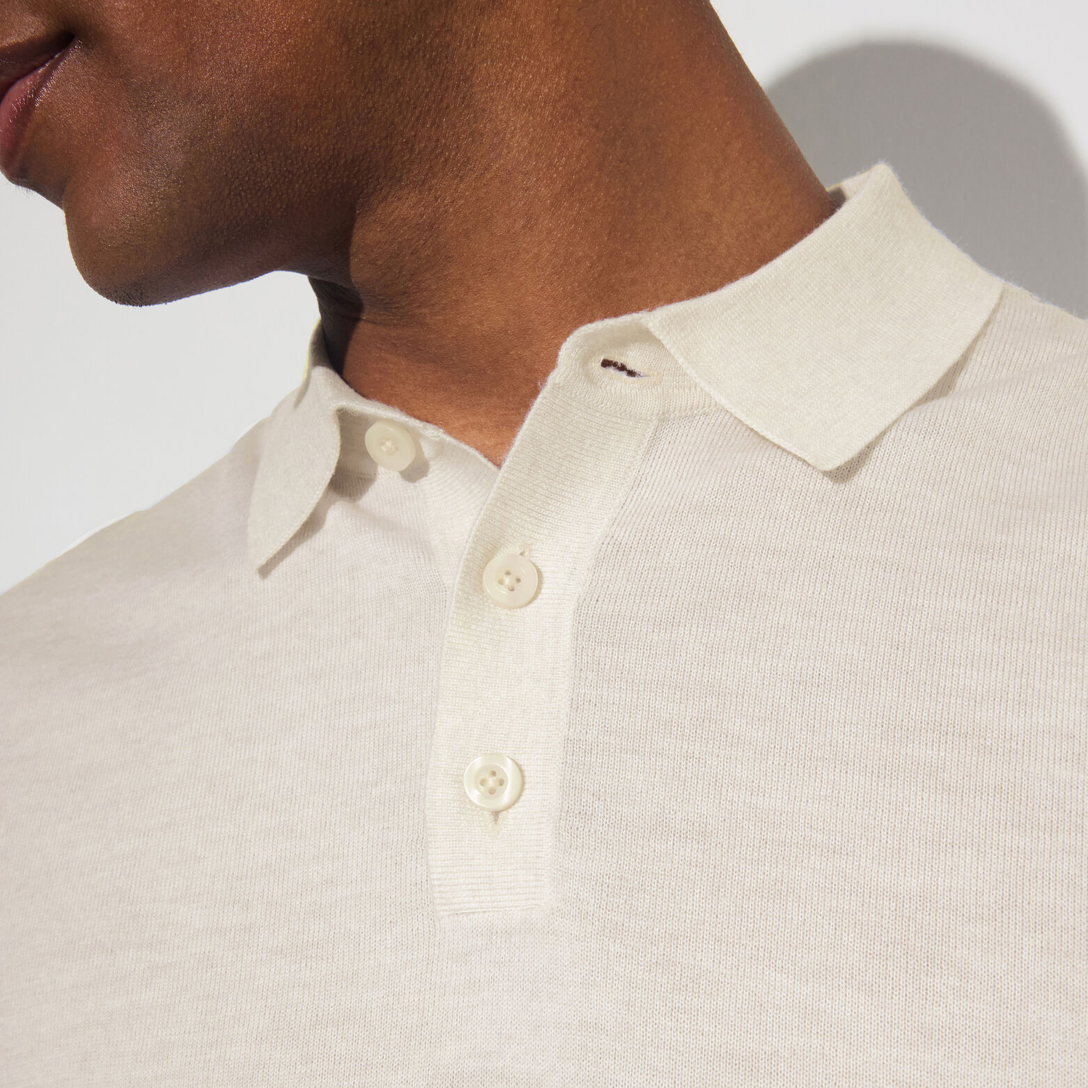 Polo met knoopkraag in merinoswol