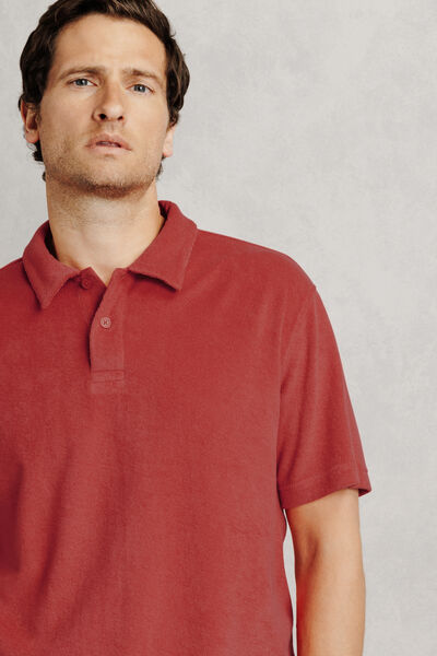 Polo manches courtes uni mati&egrave;re &eacute;ponge