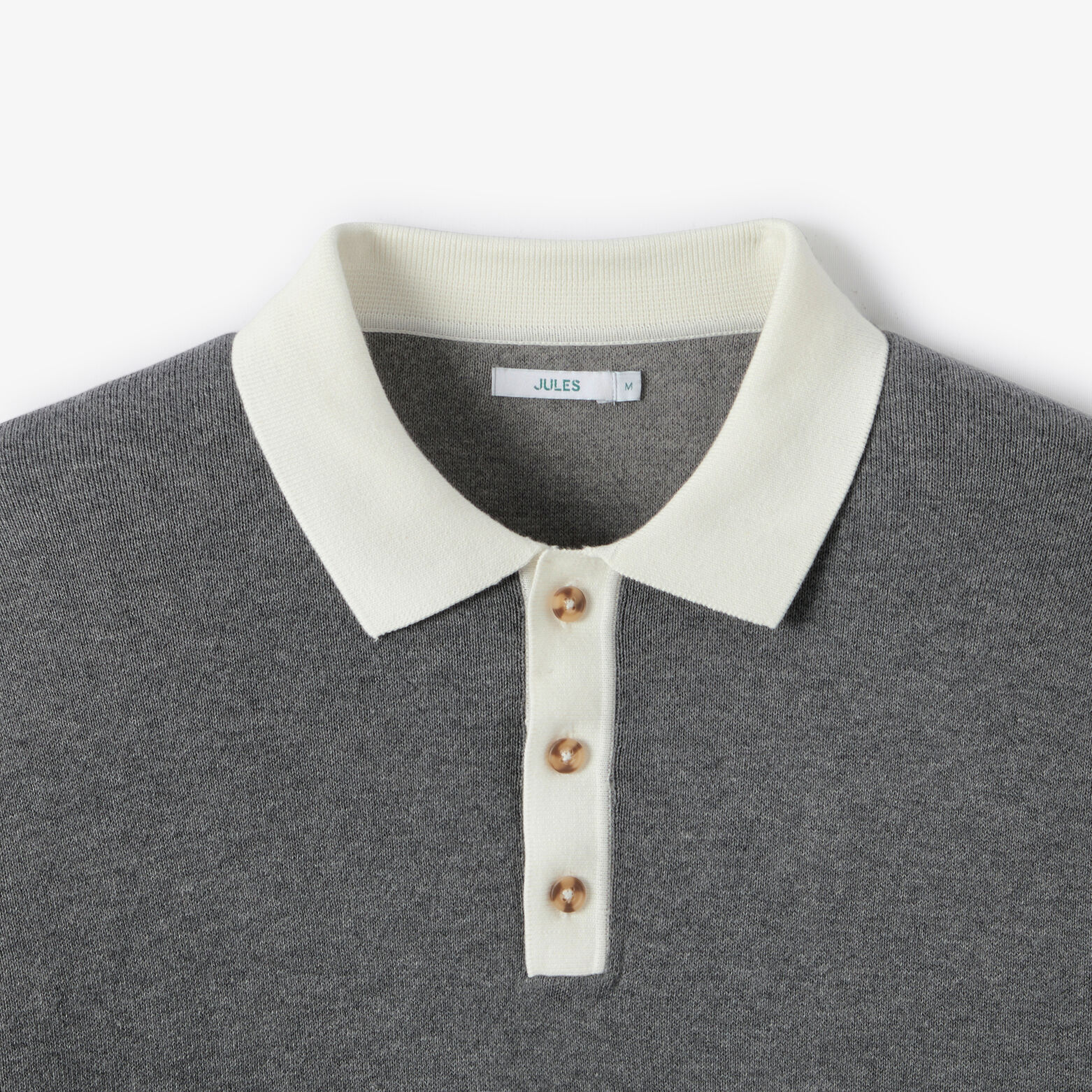 Polo en maille contrast&eacute; uni