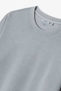 Sweat col rond mati&egrave;re effet d&eacute;lav&eacute;