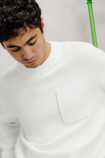 Pull col rond point de riz poche poitrine