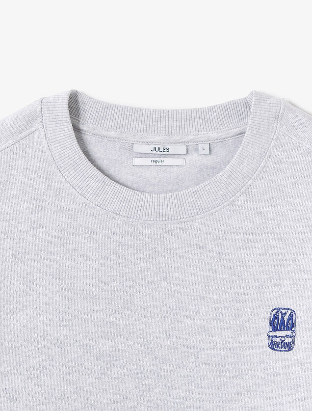 Gem&ecirc;leerde sweater ronde hals, borduursel borst