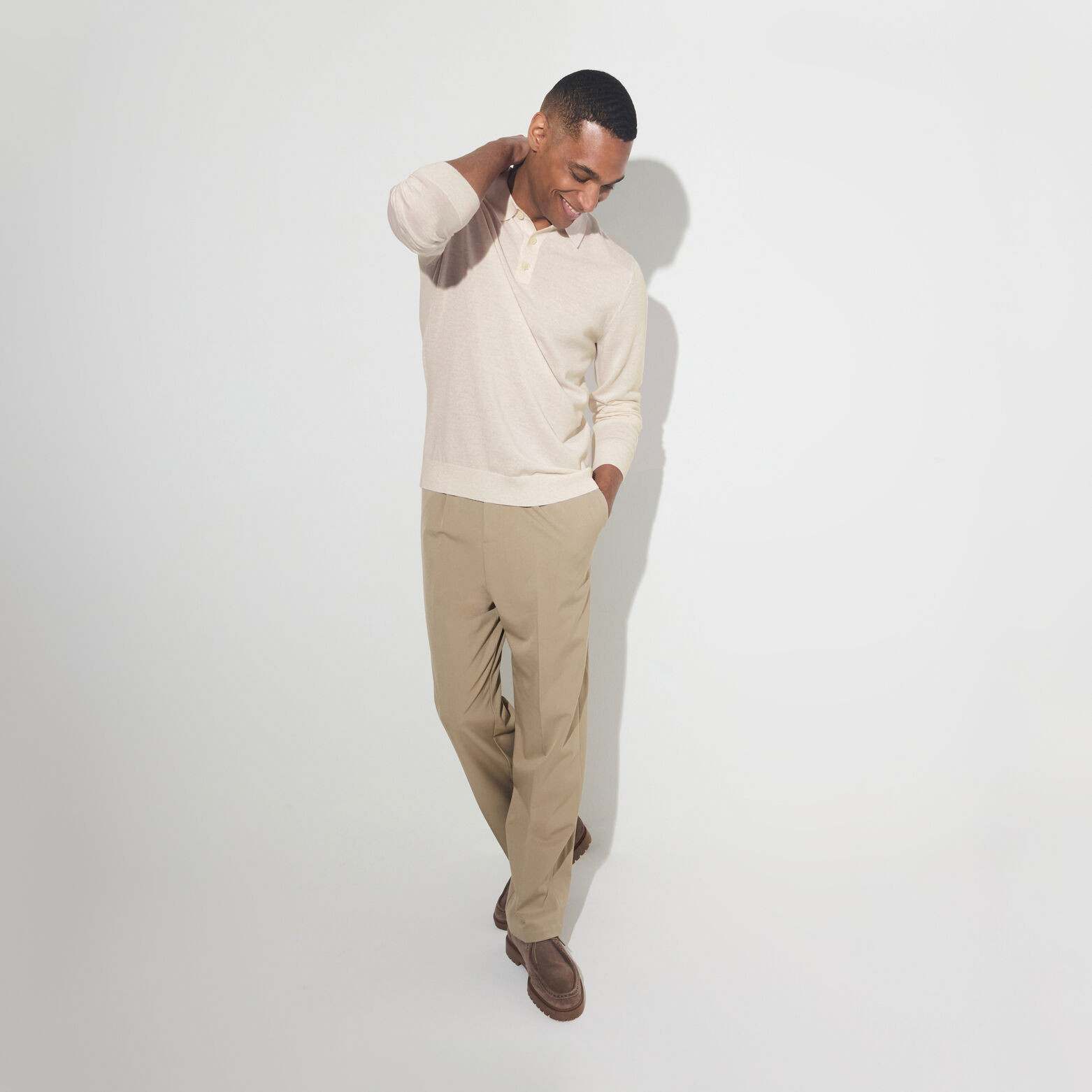 Polo met knoopkraag in merinoswol