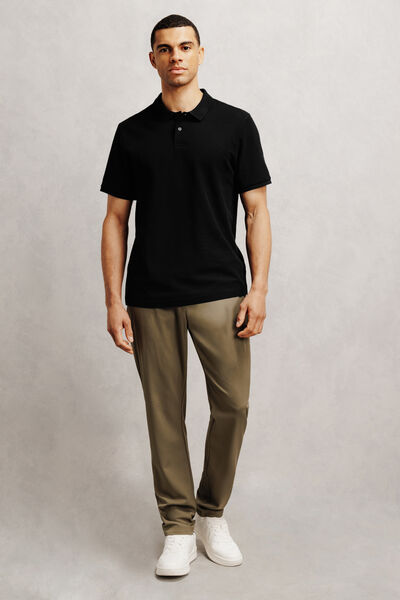 Effen polo in piqu&eacute;katoen met korte mouwen