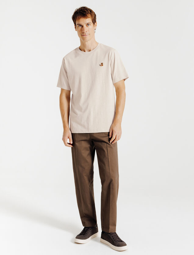T-shirt in gevlamde stof met borduursel op de bors