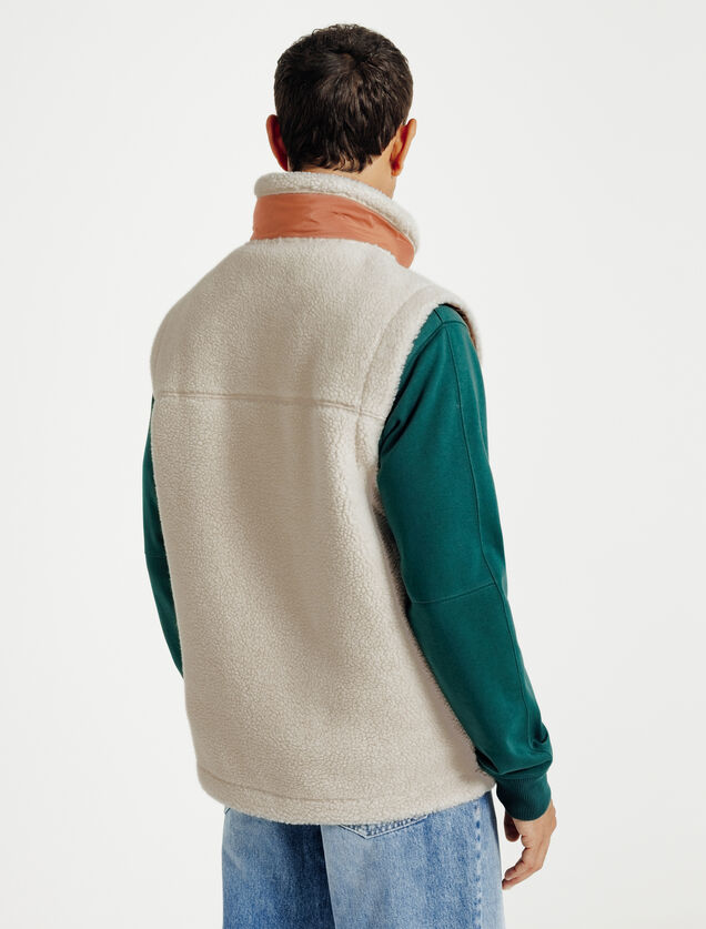 Mouwloos jasje in contrasterende sherpa