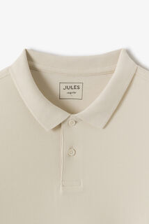 Effen polo in piqu&eacute;katoen met korte mouwen