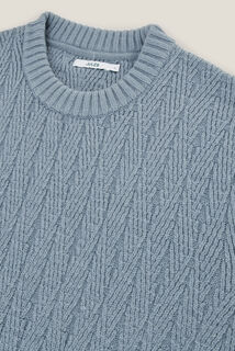 Pull col rond torsade