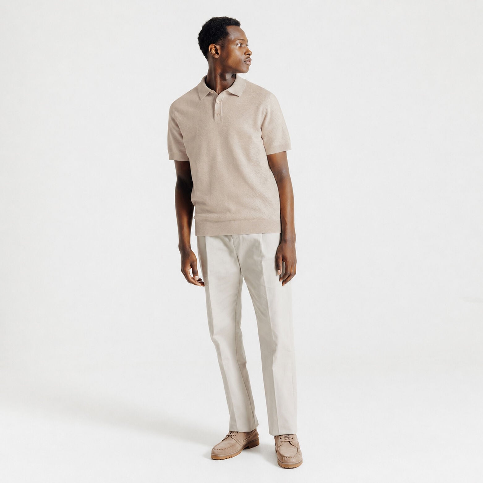 Polo met knoopkraag in tricot met fantasie stekenp