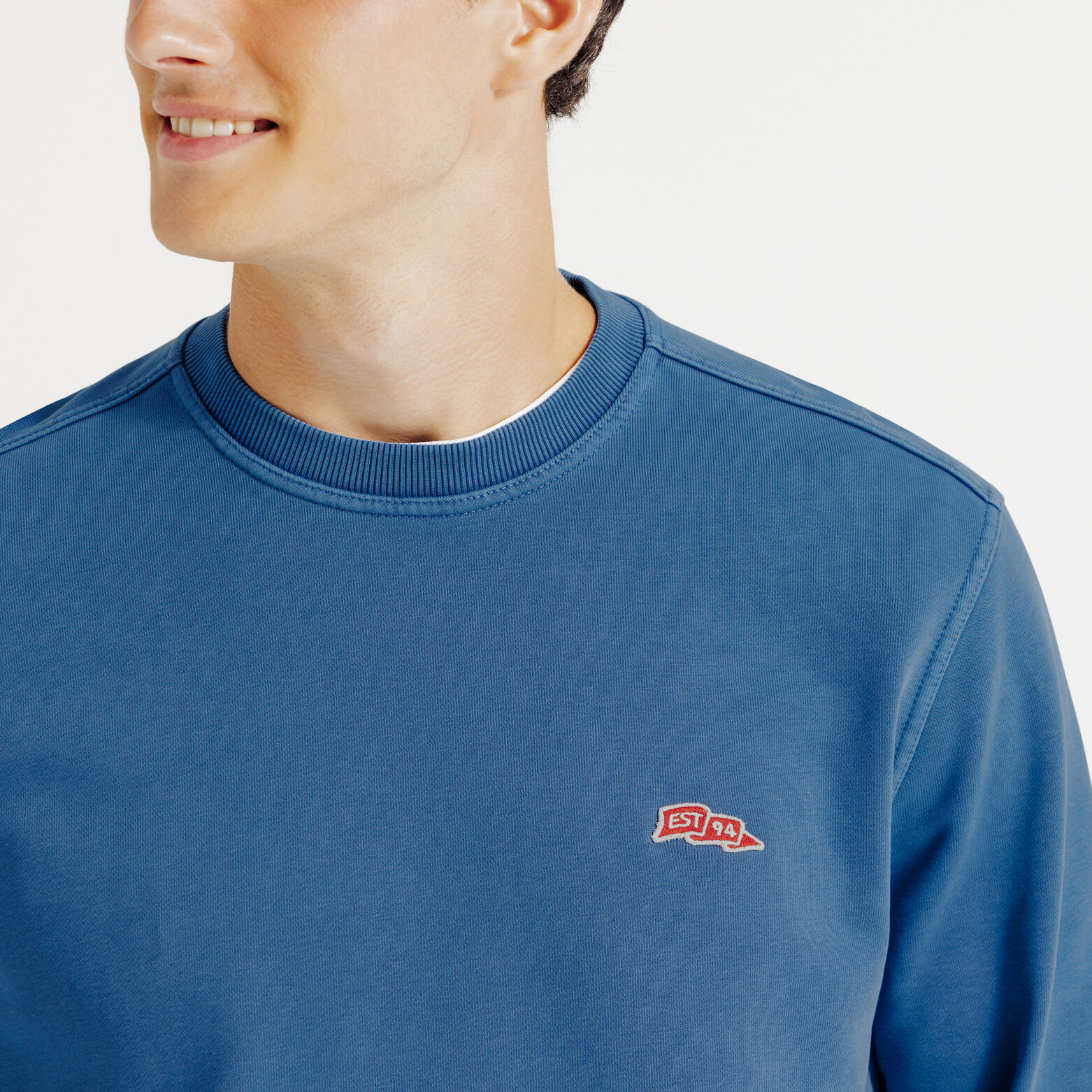 Sweat col rond effet délavé patch