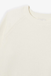 Pull col rond en cote