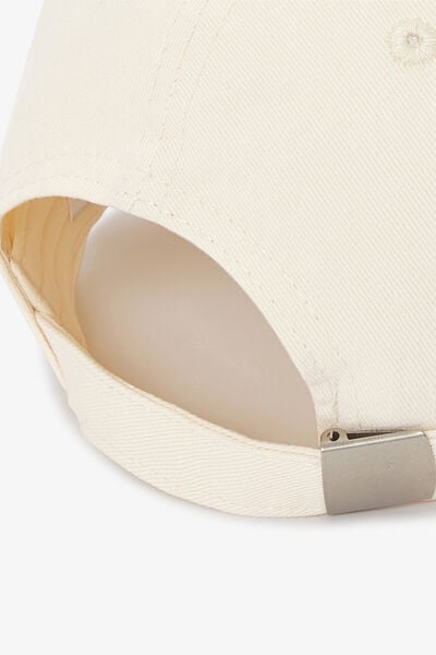 Pet met fantasie-borduursel