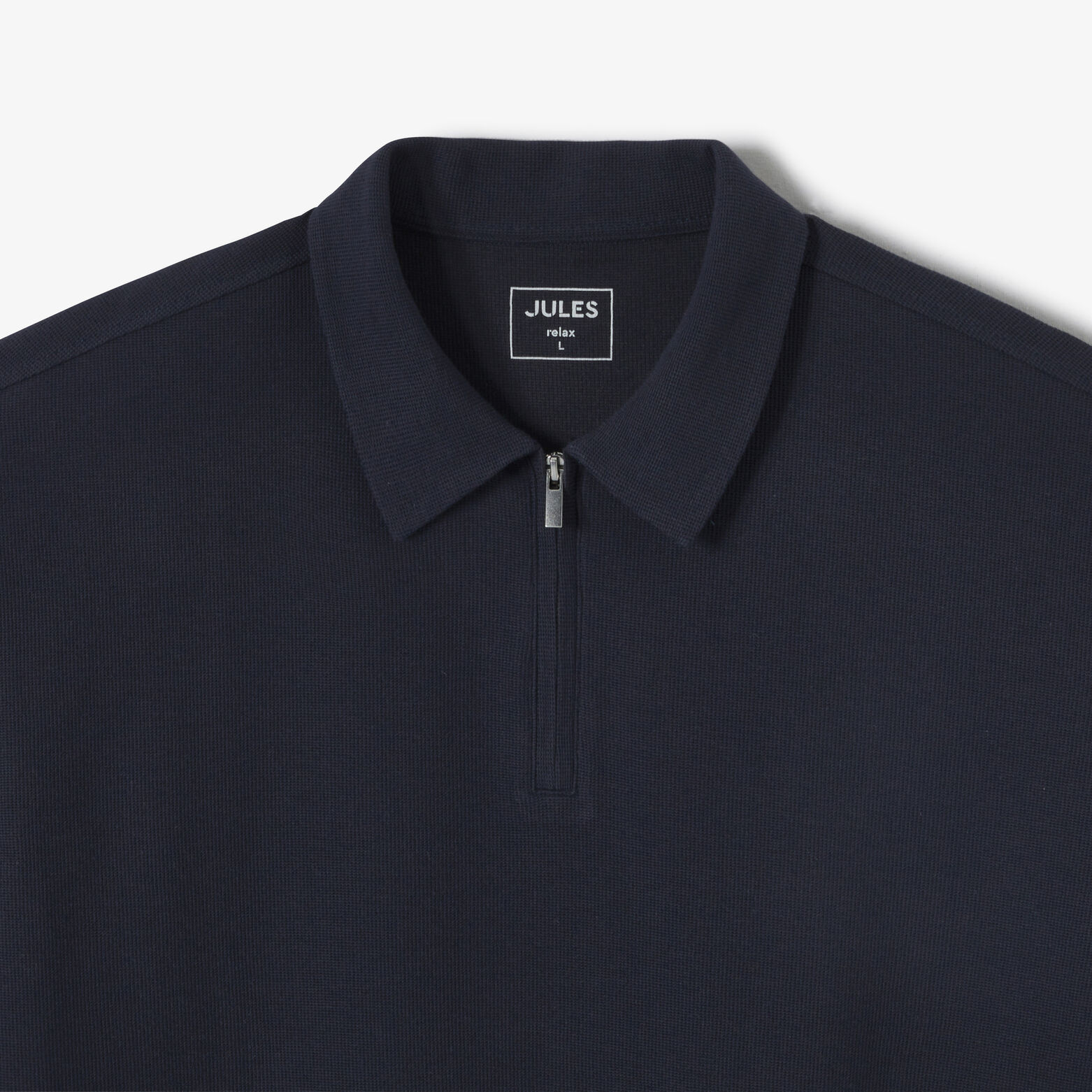 Polo manches courtes col zippé