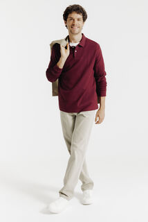 Effen polo in piqu&eacute;katoen, met lange mouwen