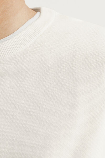 Pull col rond jeux de points fantaisie