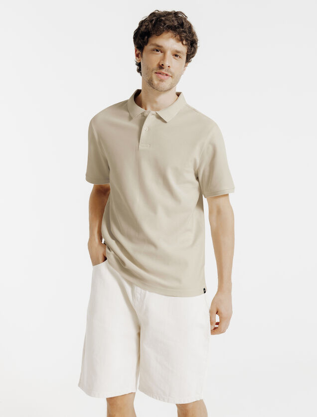 Effen polo in piqu&eacute;katoen met korte mouwen