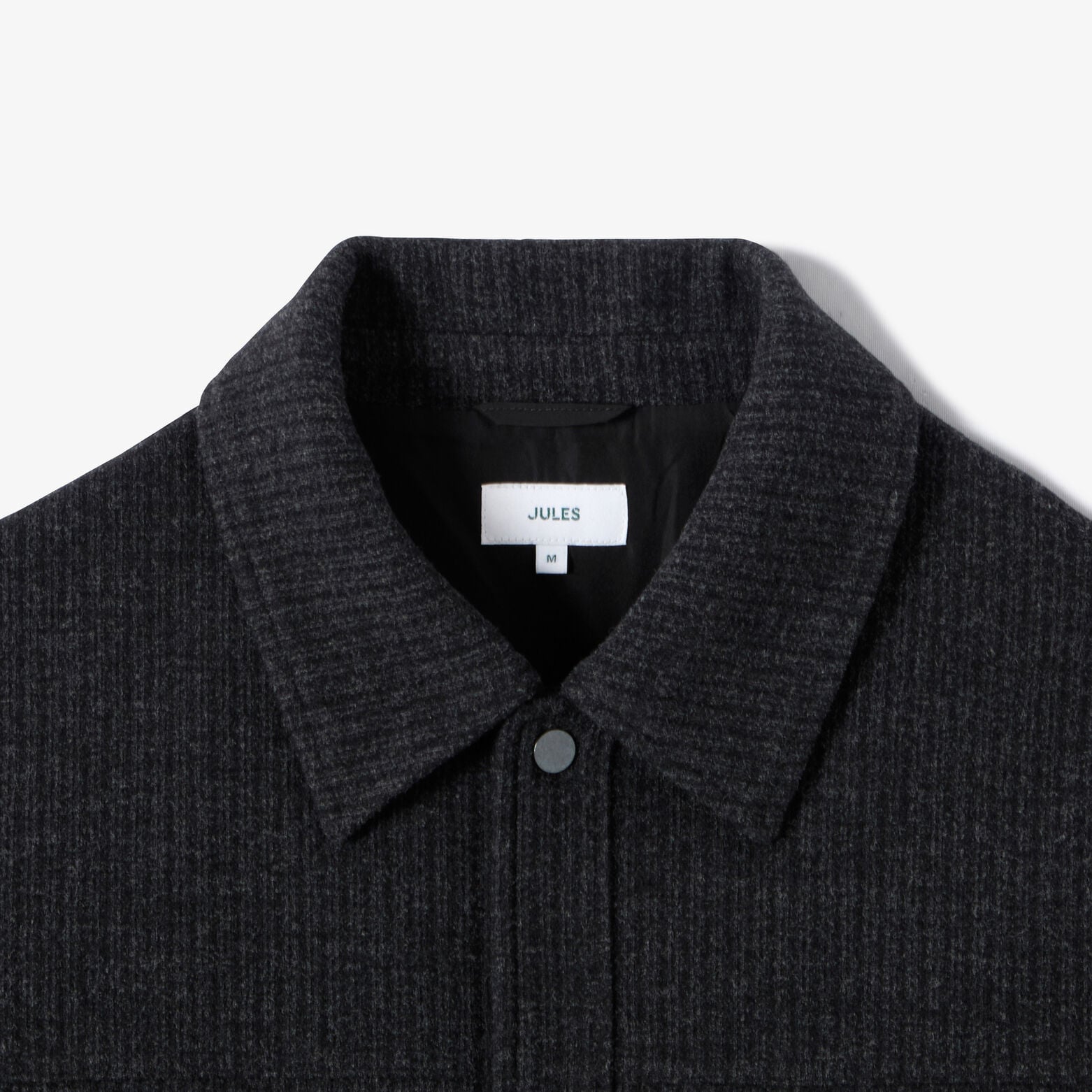 Veste pressionn&eacute;e en maille