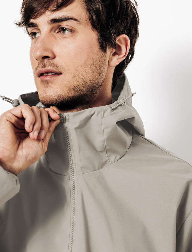 Blouson coupe-vent à capuche