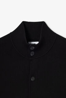 Gilet met knopen en opstaande kraag