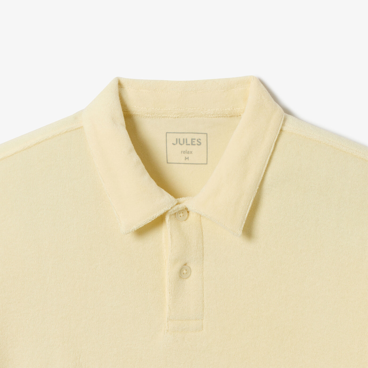 Polo manches courtes uni mati&egrave;re &eacute;ponge