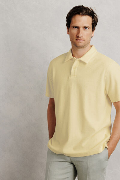 Polo manches courtes uni mati&egrave;re &eacute;ponge