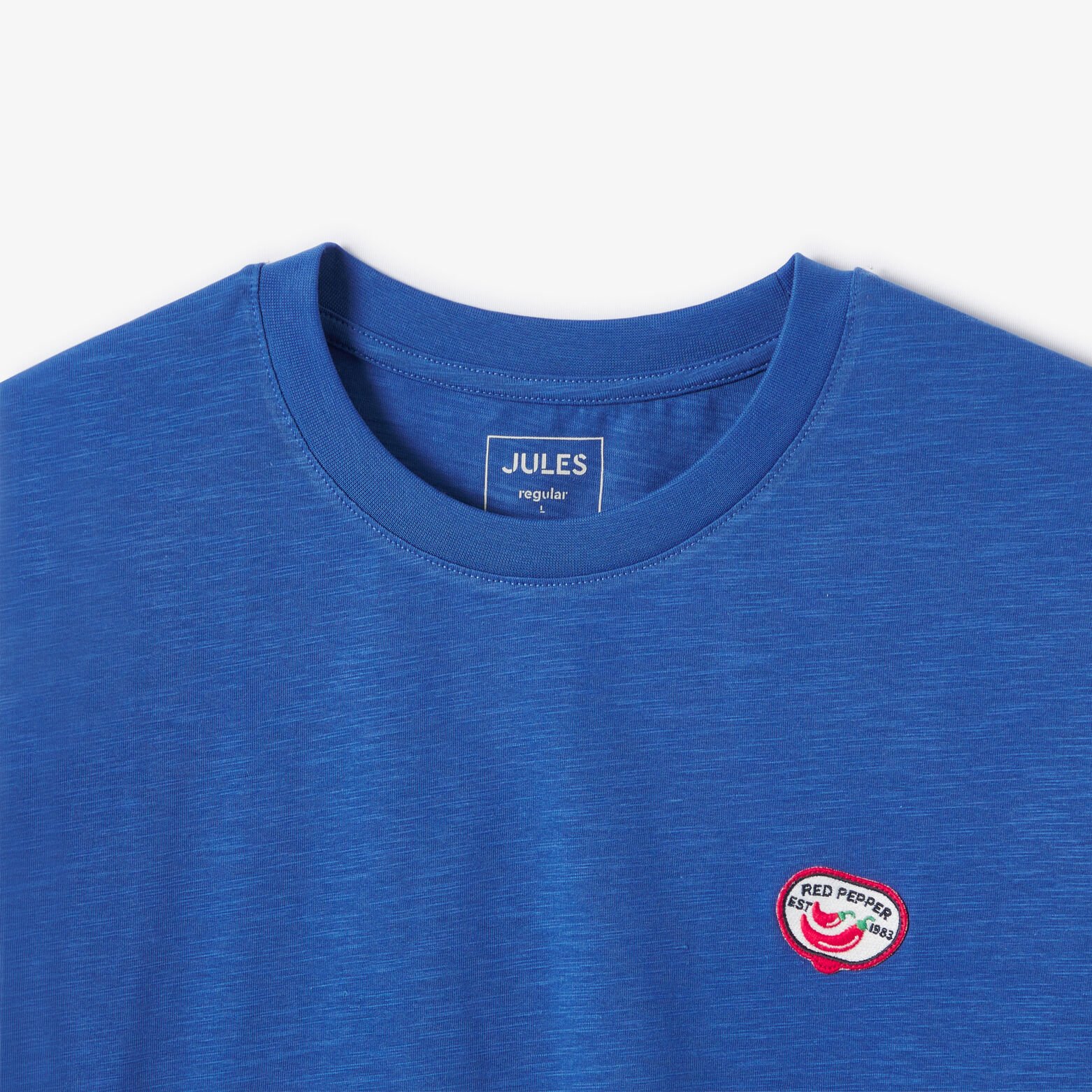 T-shirt in gevlamde stof met borduursel op de bors