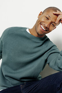 Pull col rond en cote