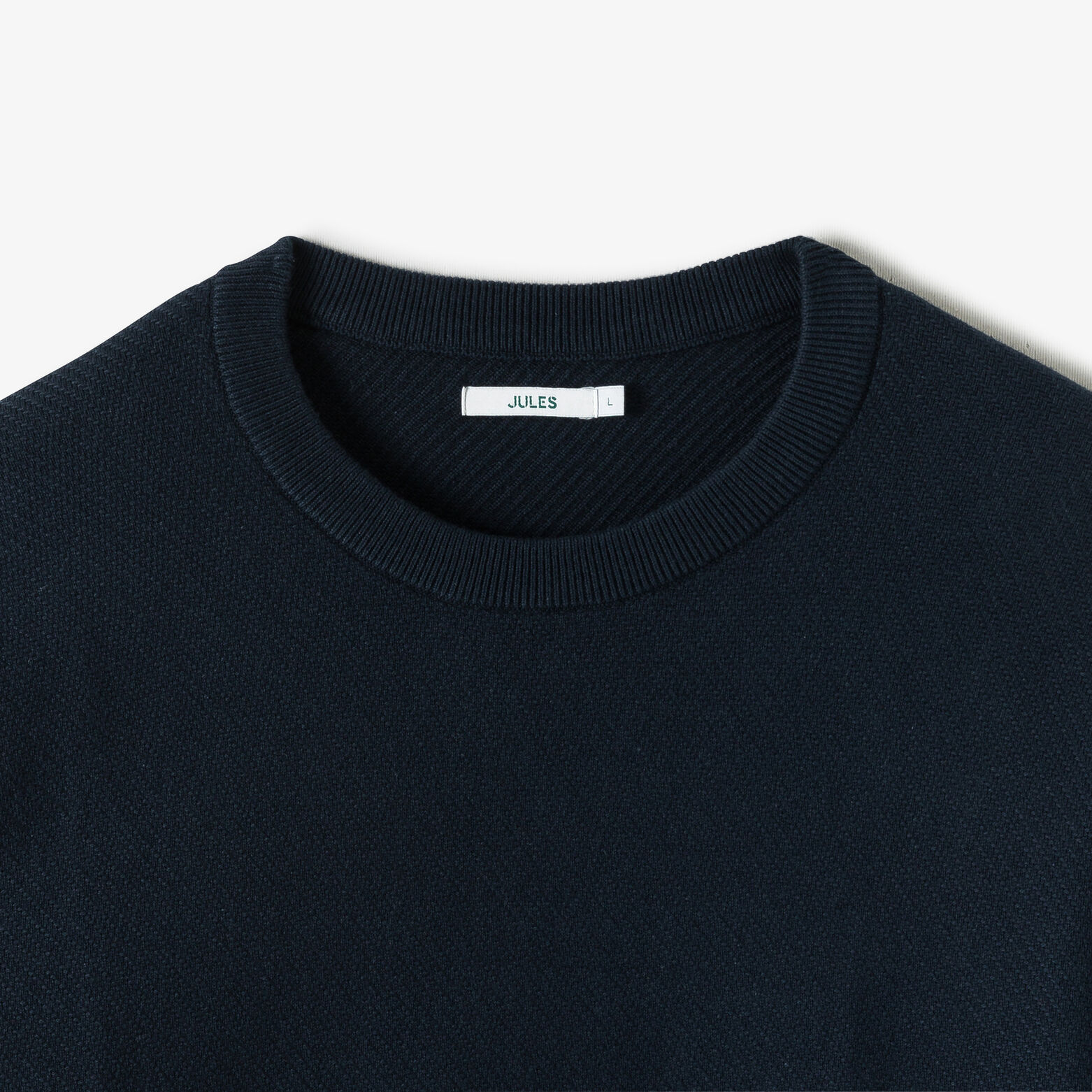 Pull col rond jeux de points fantaisie