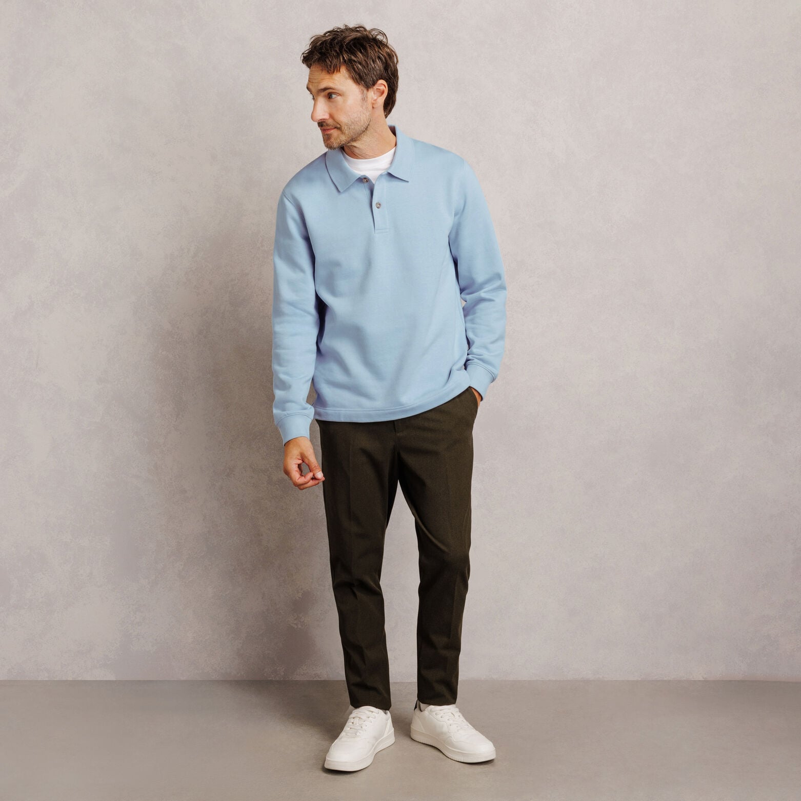 Polo en molleton boutonn&eacute; uni