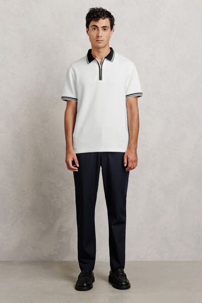 Polo manches courtes col zipp&eacute; gaufr&eacute;