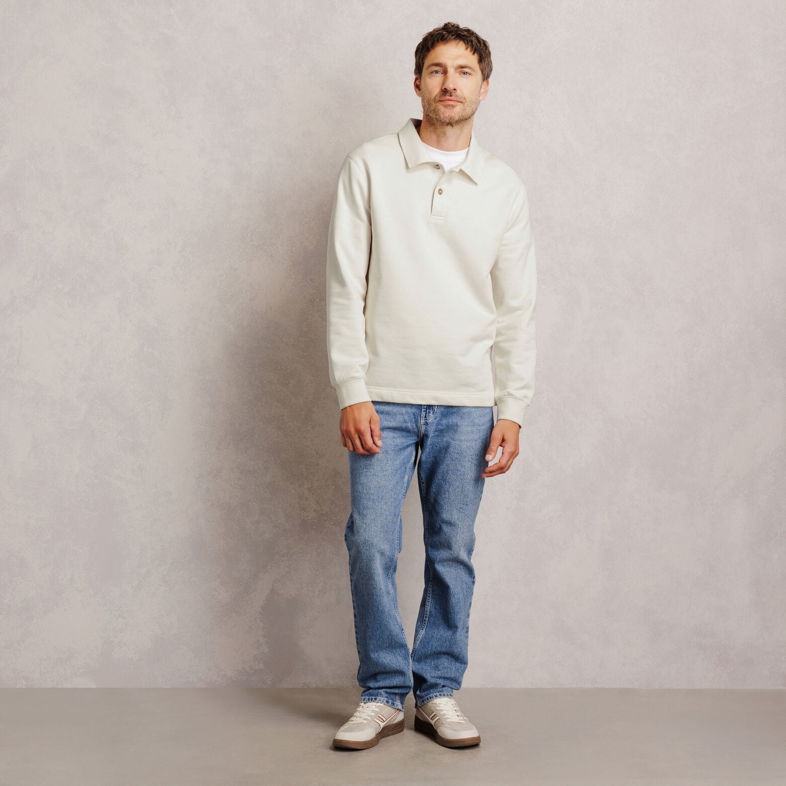 Polo en molleton boutonn&eacute; uni