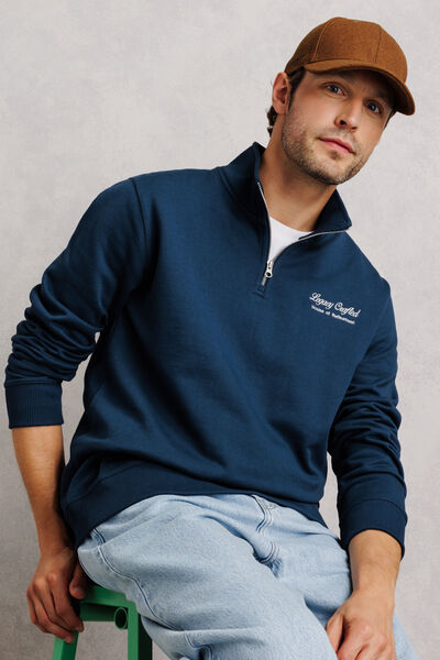 Sweater met ritskraag, geborduurd "Legacy crafted"