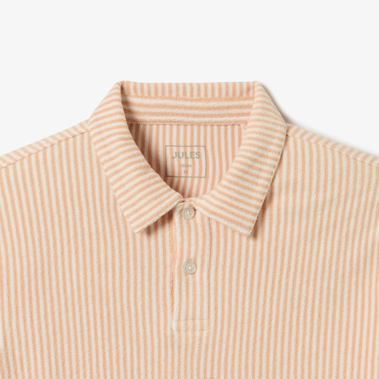 Polo manches courtes uni mati&egrave;re &eacute;ponge