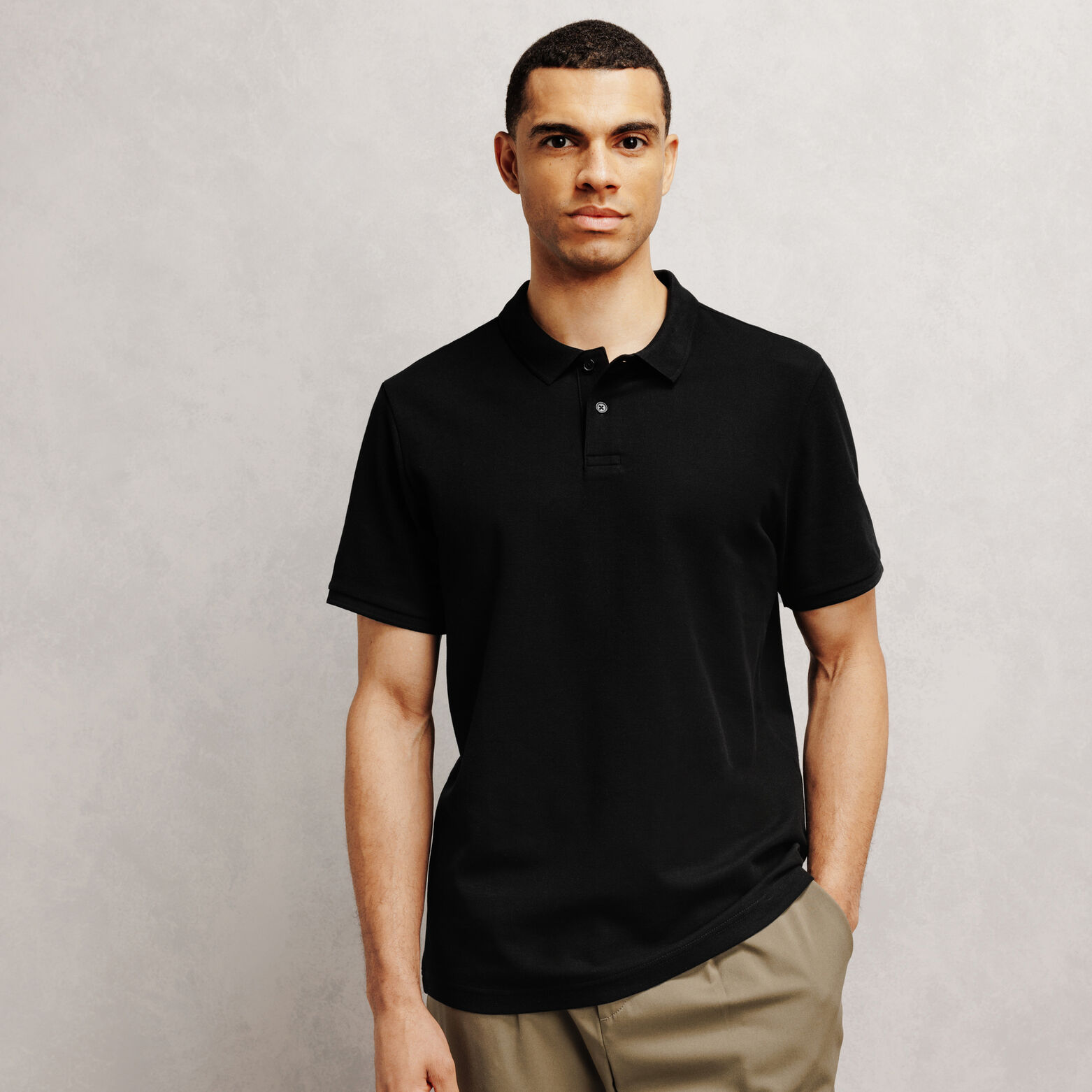 Polo manches courtes piqu&eacute; uni