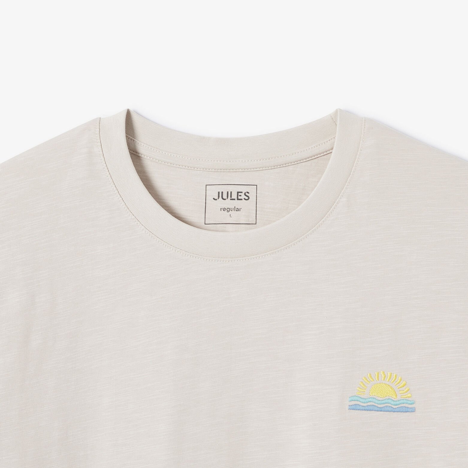 T-shirt in gevlamde stof met borduursel op de bors