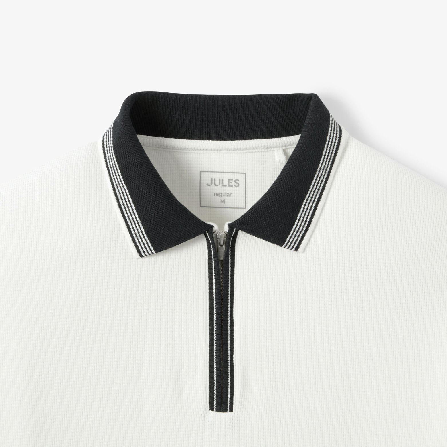 Polo manches courtes col zipp&eacute; gaufr&eacute;