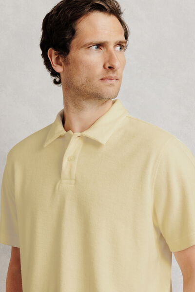 Polo manches courtes uni mati&egrave;re &eacute;ponge