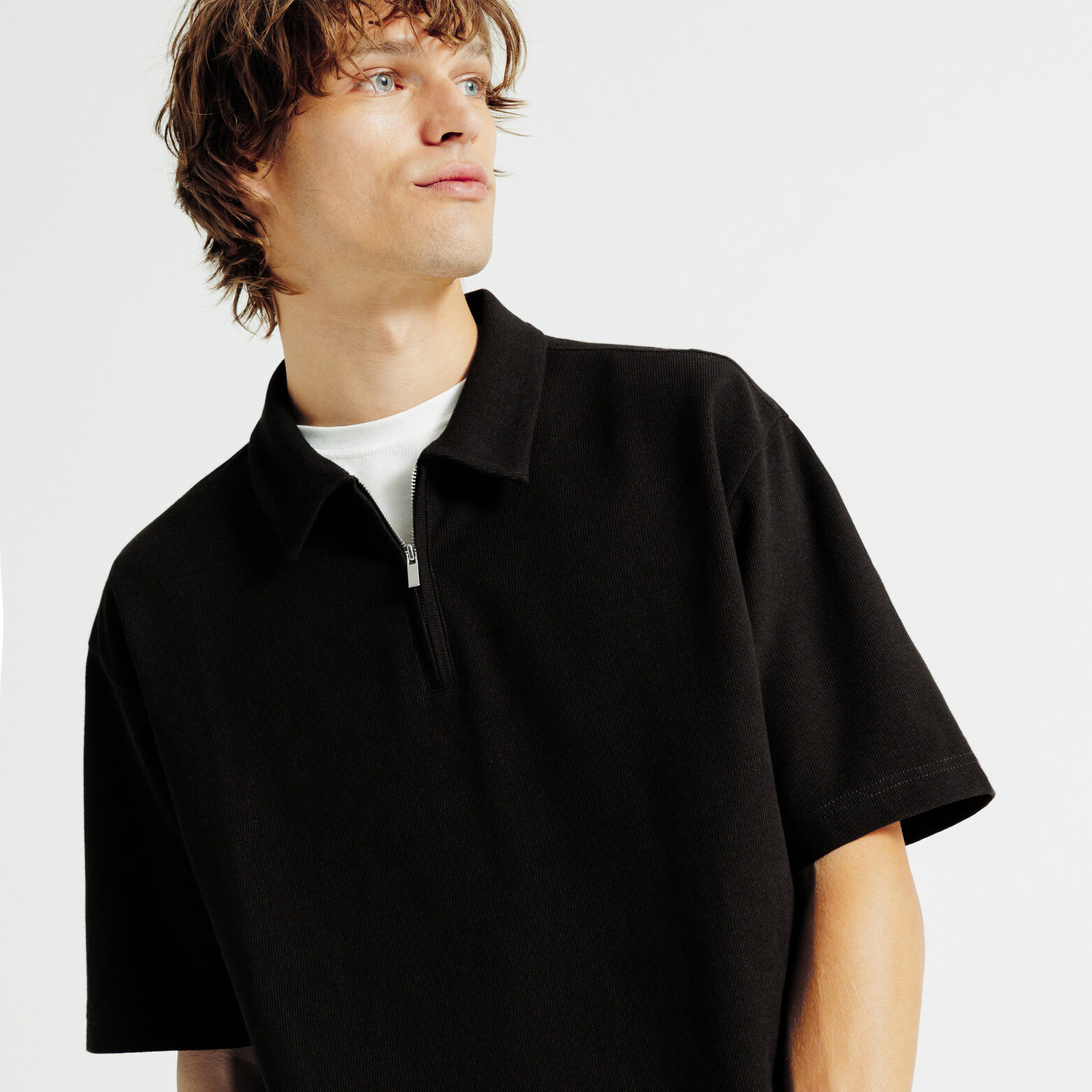 Polo manches courtes col zippé