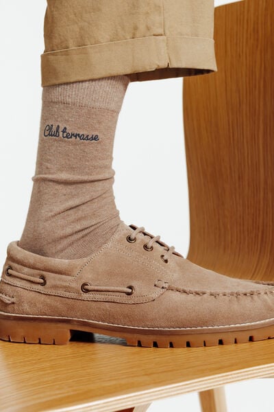 Hoge sokken met opschrift