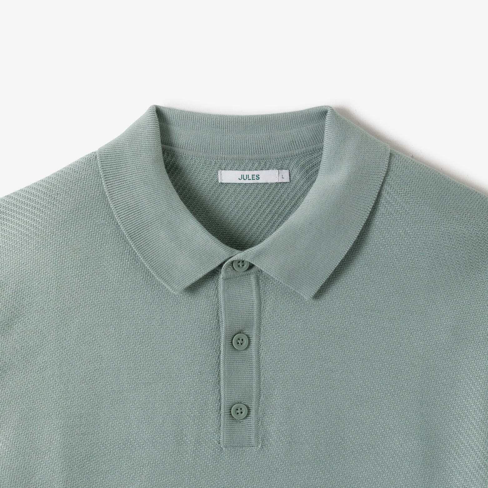 Polo en maille col boutonn&eacute; jeux de points