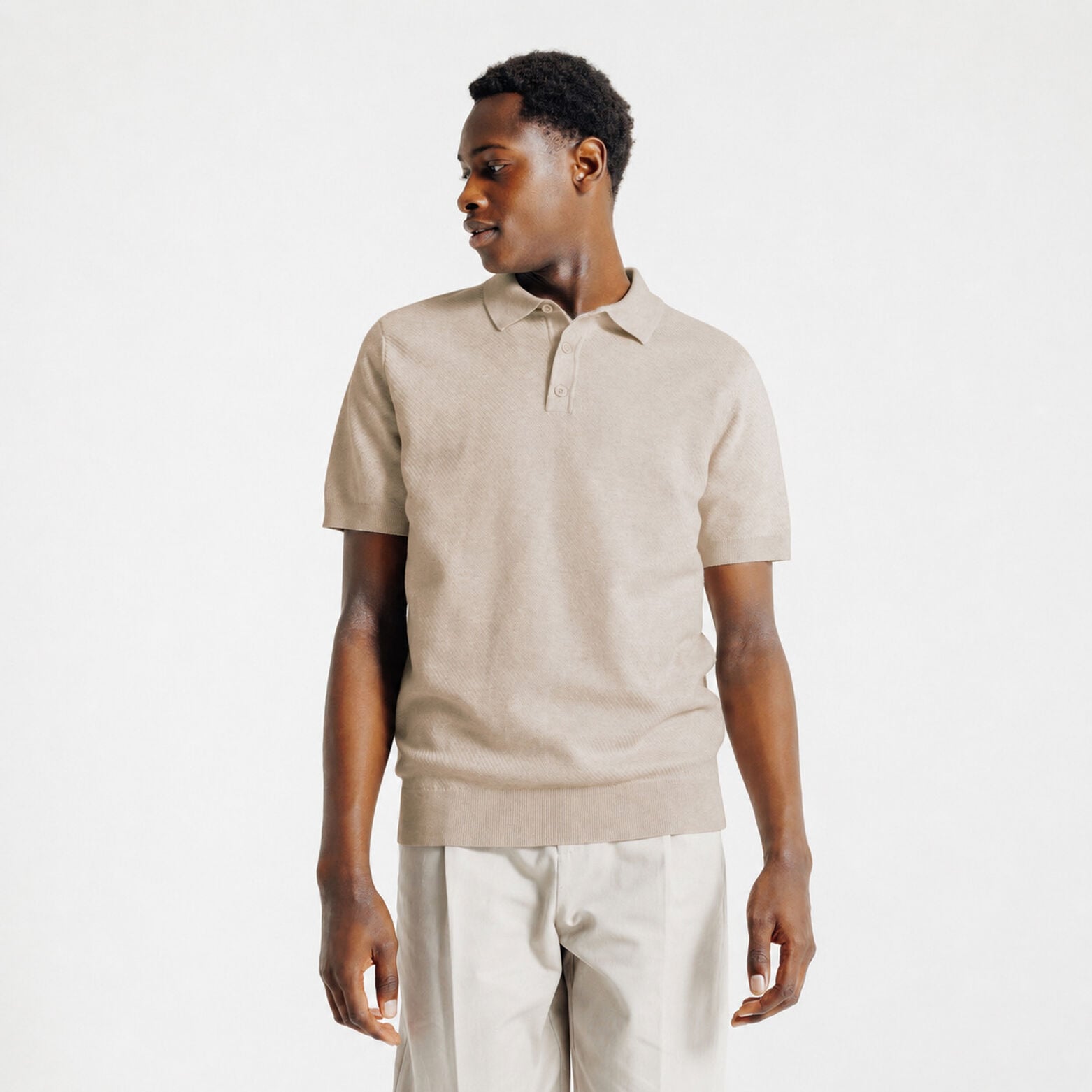 Polo met knoopkraag in tricot met fantasie stekenp