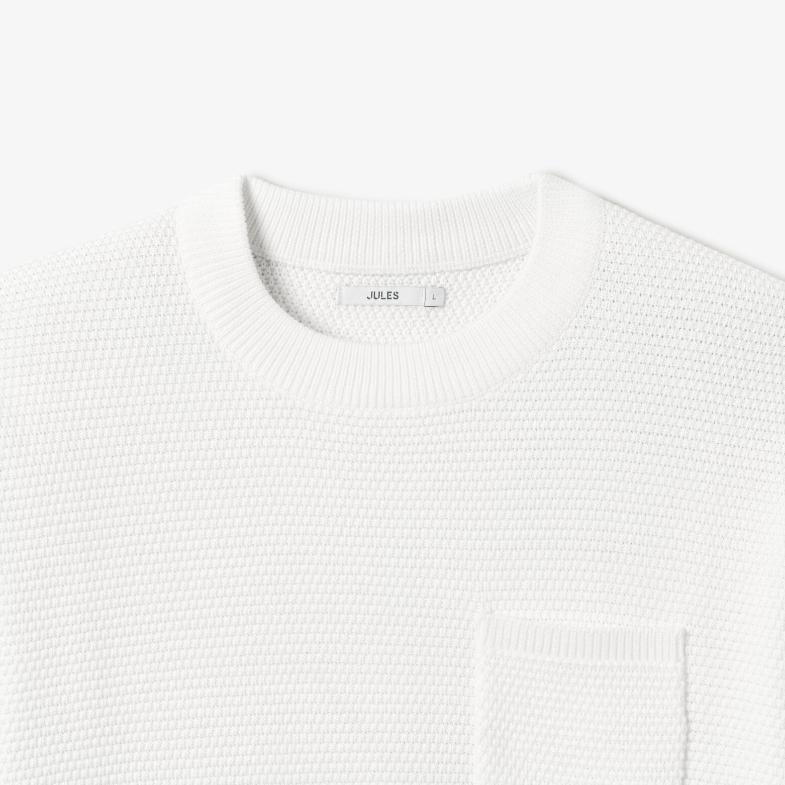 Pull col rond point de riz poche poitrine