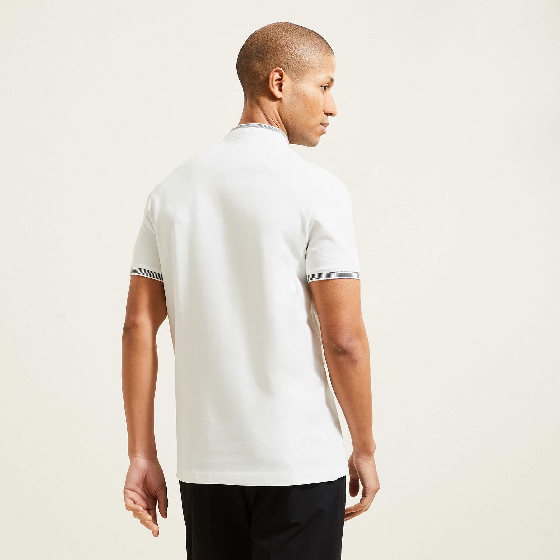Polo manches courtes slim uni col mao pique